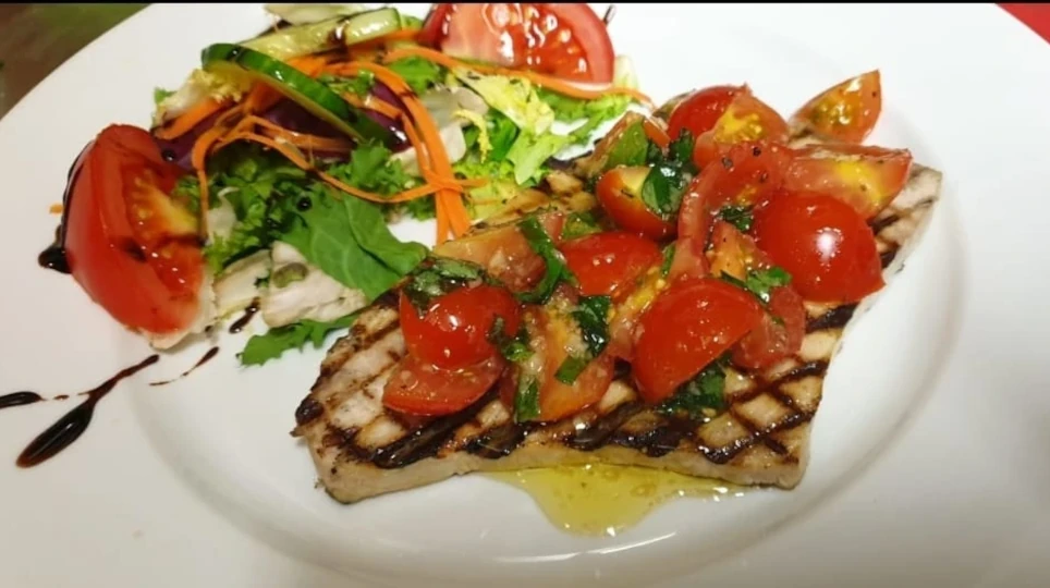 Grilled swordfish and cherry tomatoes